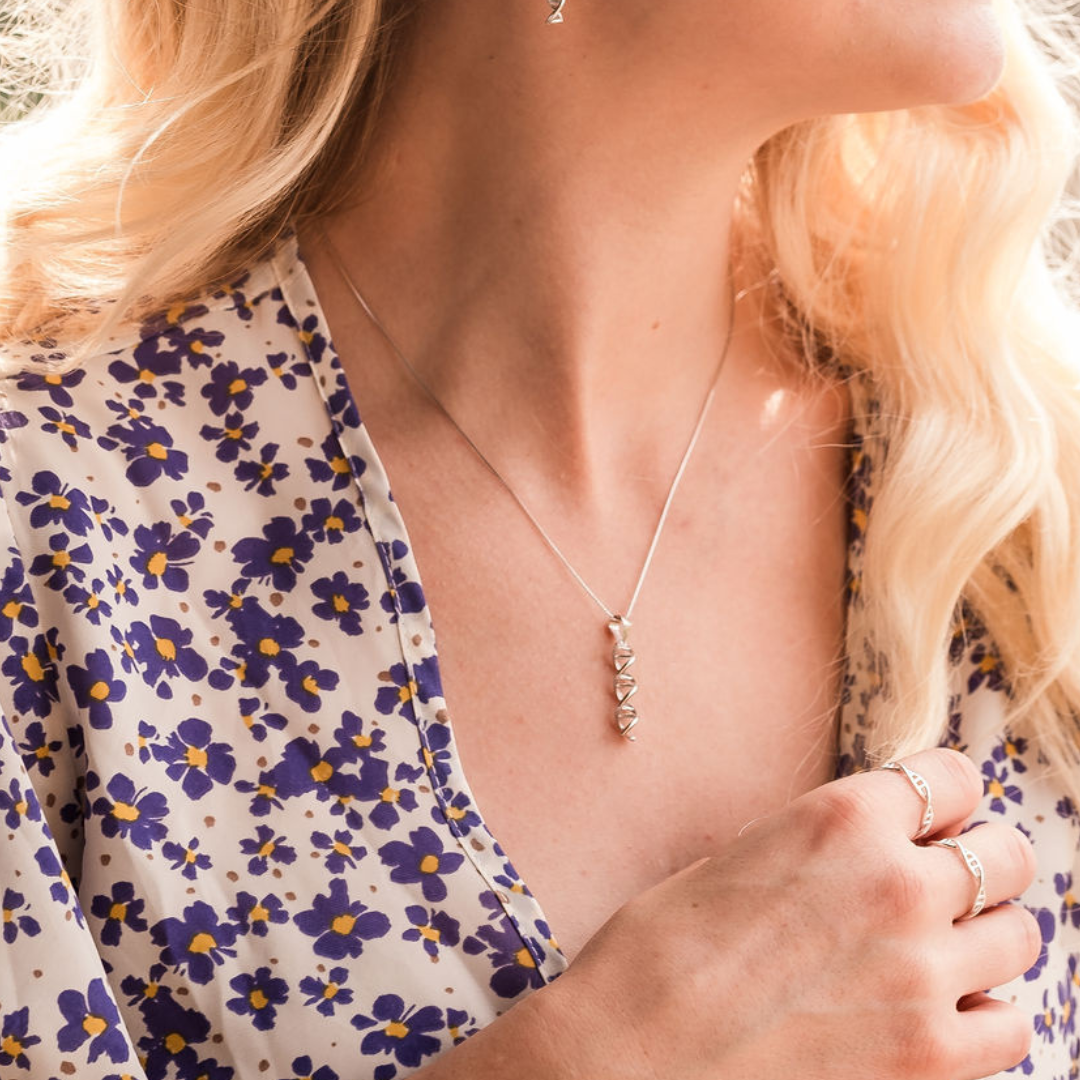 Model wearing DNA double helix necklace in silver - chemistry inspired jewellery gift for science lovers | My Chemical Gift