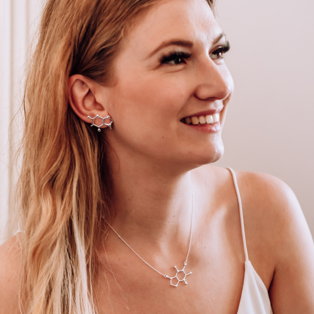 Model wearing caffeine molecule earrings and necklace in silver - chemistry inspired jewellery gift for coffee lovers | My Chemical Gift