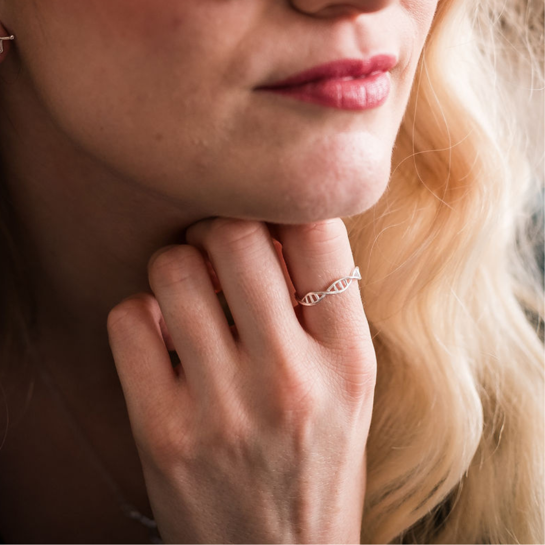 Model wearing DNA double helix ring in silver - chemistry inspired jewellery gift for science lovers | My Chemical Gift