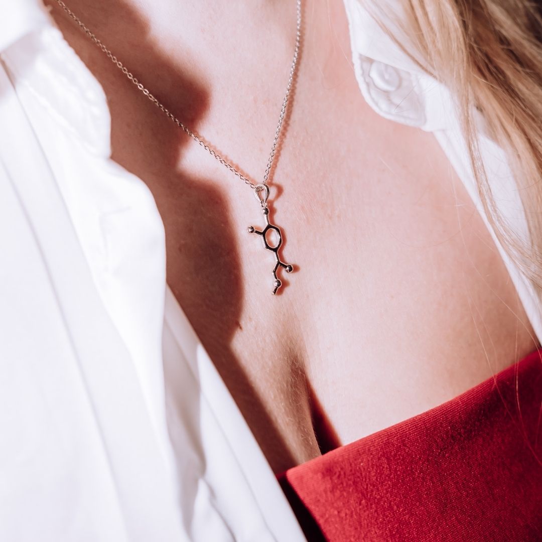 Model wearing adrenaline molecule necklace in silver - chemistry inspired jewellery gift for science lovers | My Chemical Gift