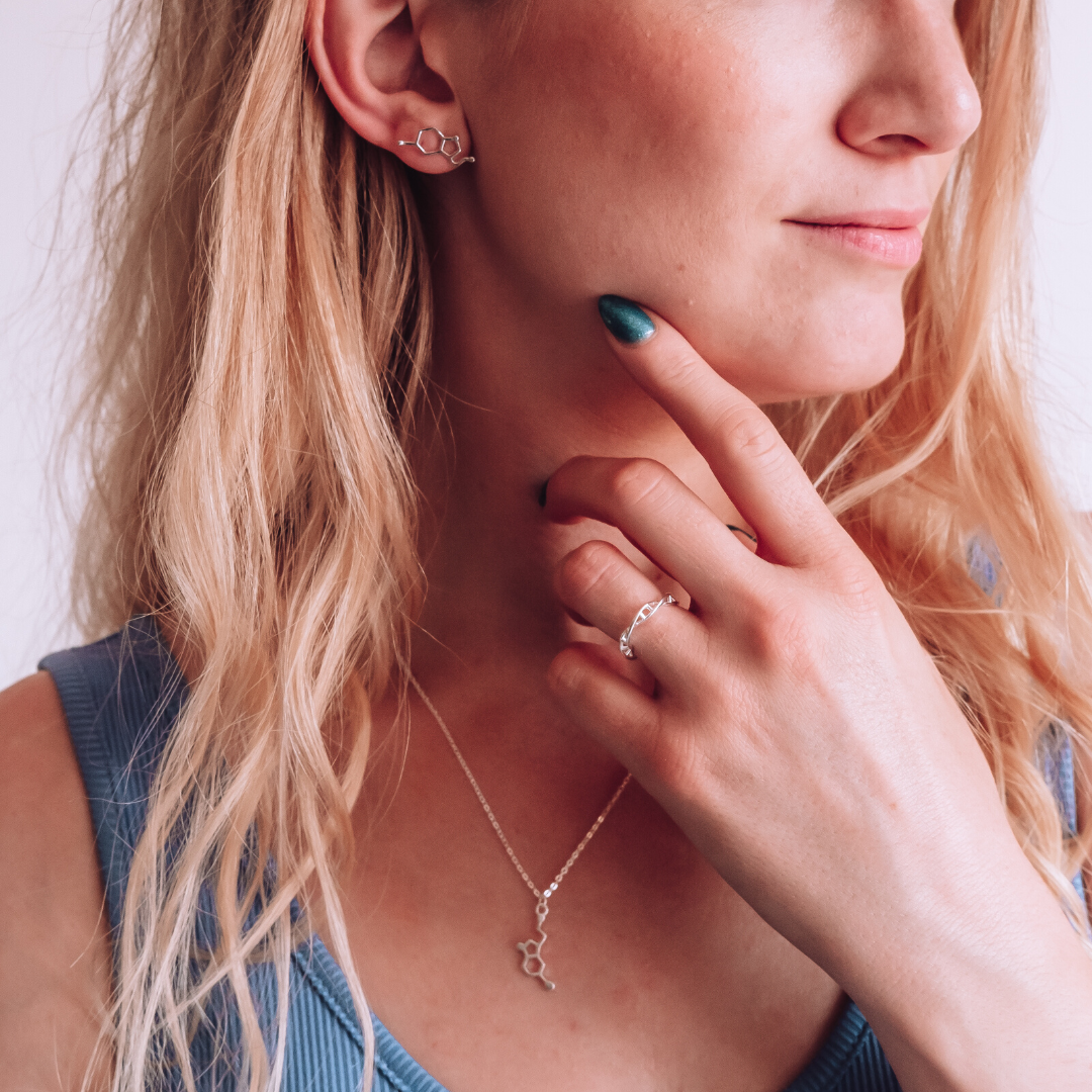 Model wearing serotonin molecule necklace in silver - chemistry inspired jewellery gift for science lovers | My Chemical Gift