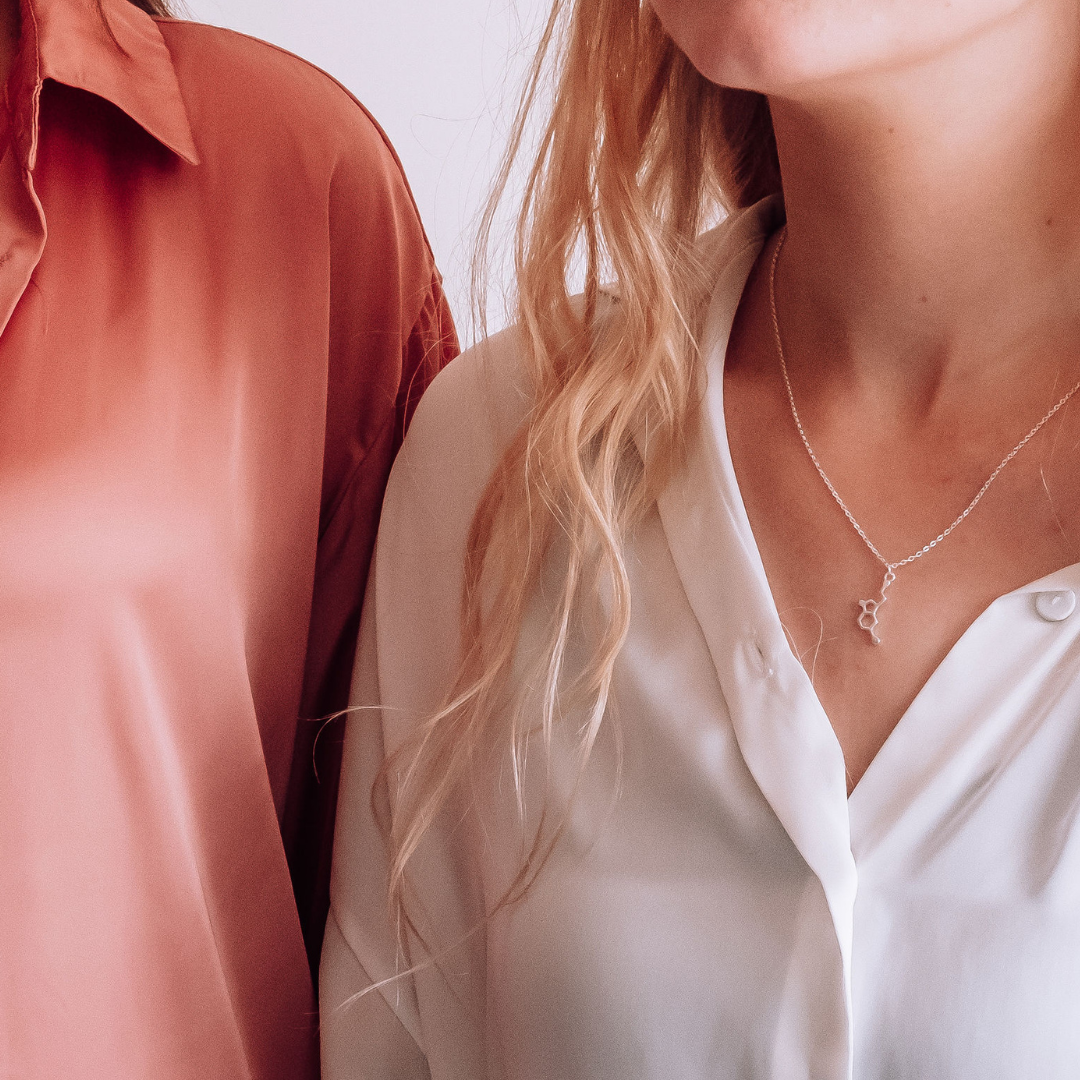 Model wearing serotonin molecule necklace in silver - chemistry inspired jewellery gift for science lovers | My Chemical Gift
