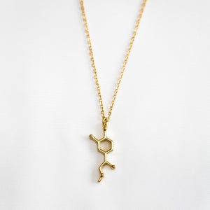 Adrenaline molecule shaped gold necklace