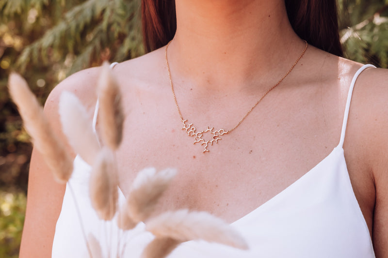 Gold oxytocin molecule necklace