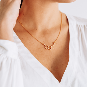 gold serotonin molecule necklace