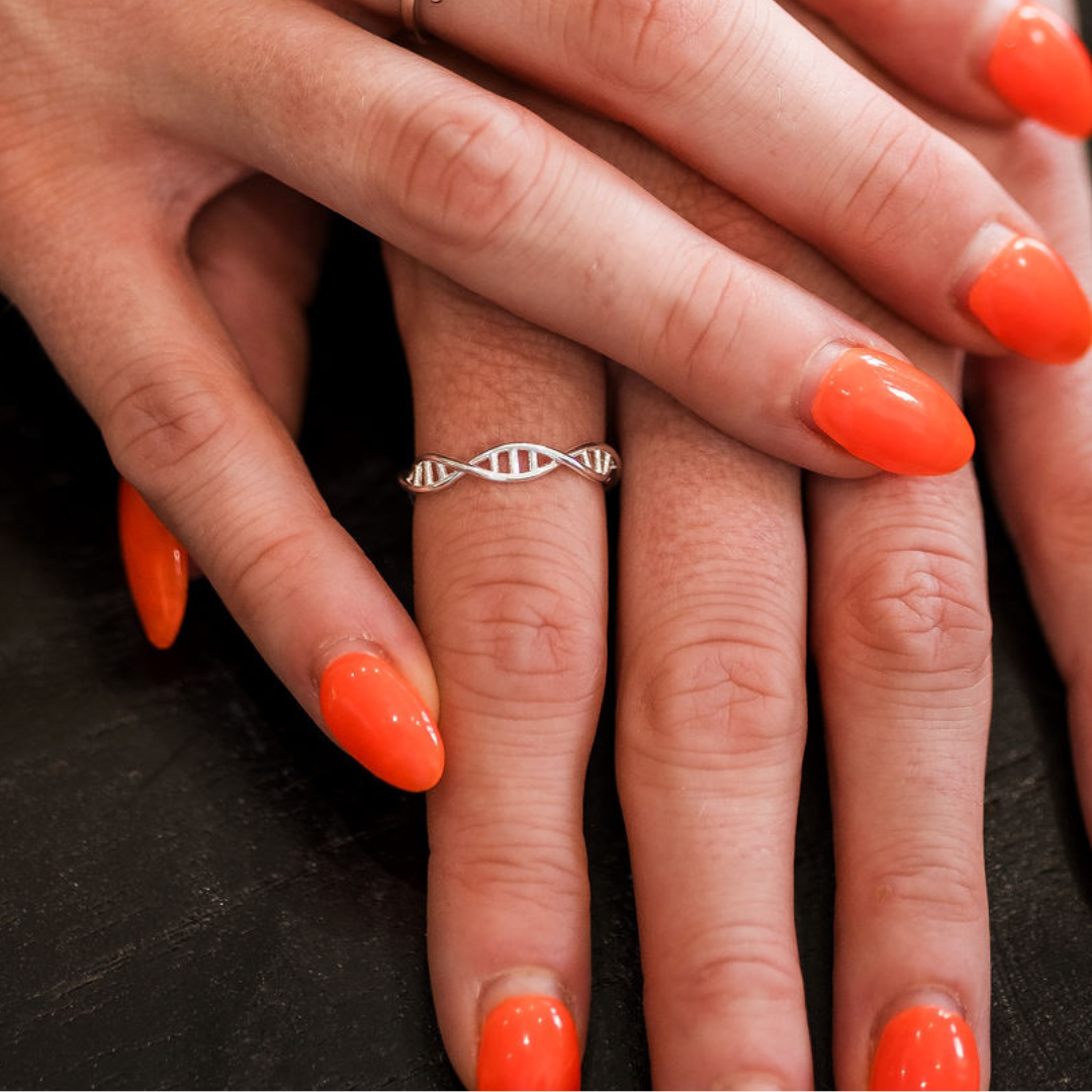 Model wearing DNA double helix ring in silver - chemistry inspired jewellery gift for science lovers | My Chemical Gift