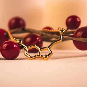 Serotonin molecule necklace in gold - chemistry inspired jewellery for science lovers 