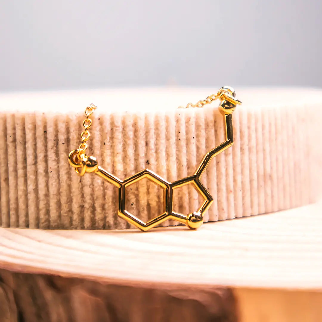 Serotonin molecule necklace in gold - chemistry inspired jewellery for science lovers 