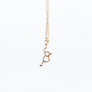 Gold serotonin molecule necklace 