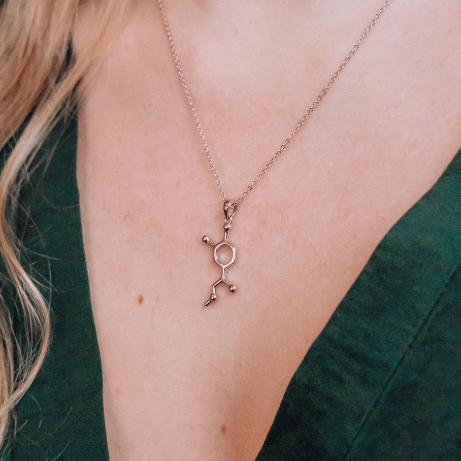 Model wearing adrenaline molecule necklace in silver - chemistry inspired jewellery gift for science lovers | My Chemical Gift
