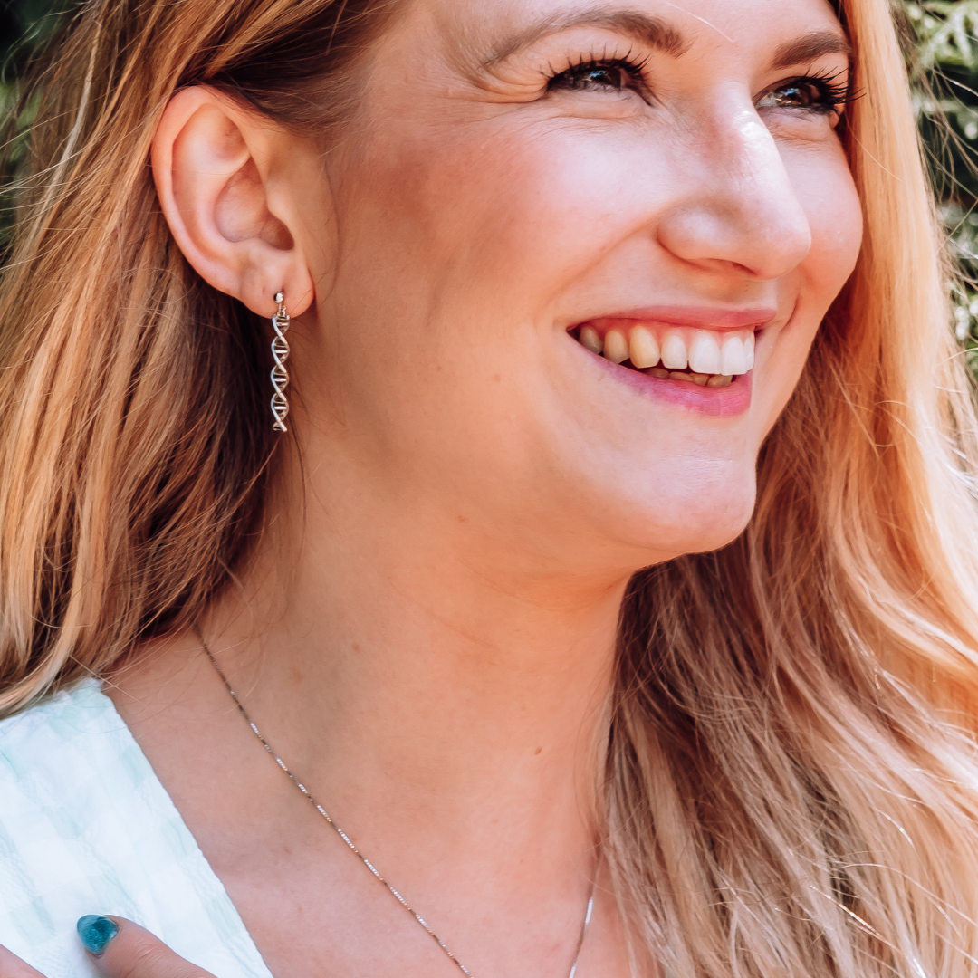 Model wearing DNA double helix earrings in silver - chemistry inspired jewellery gift for science lovers | My Chemical Gift